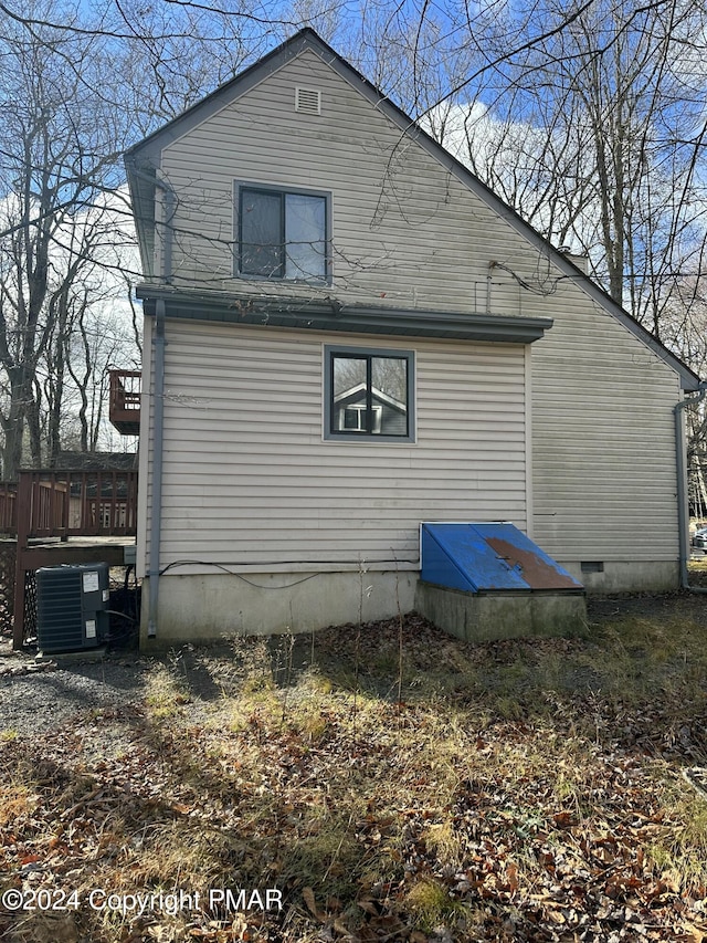 view of property exterior with cooling unit