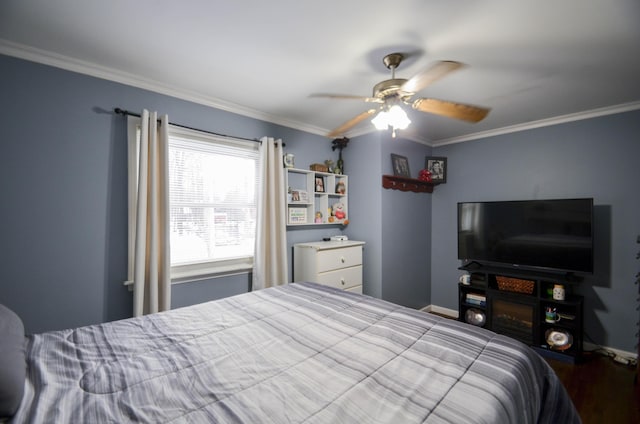 bedroom featuring ceiling fan, baseboards, crown molding, and wood finished floors