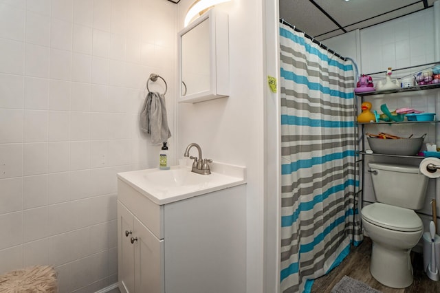 full bathroom with wood finished floors, vanity, toilet, and a shower with shower curtain