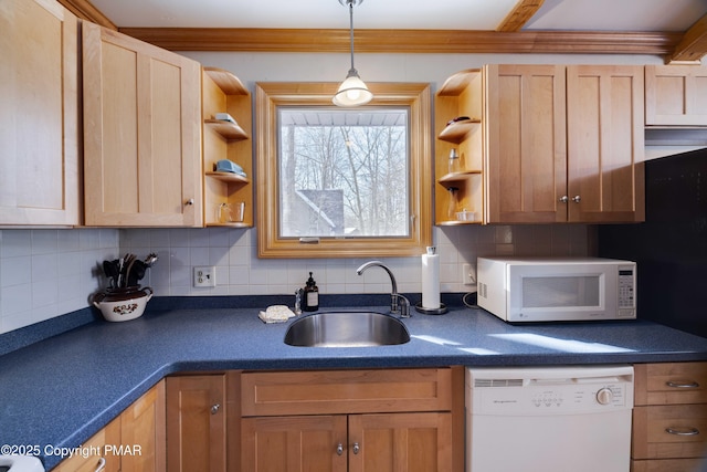 kitchen featuring pendant lighting, tasteful backsplash, sink, light brown cabinets, and white appliances