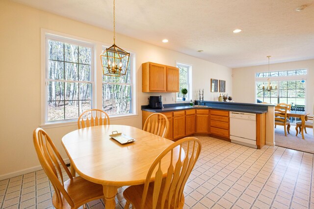 355 Windy Bush Rd, Pocono Pines, PA 18350 - dining space with a chandelier, plenty of natural light, recessed lighting, baseboards, and light carpet