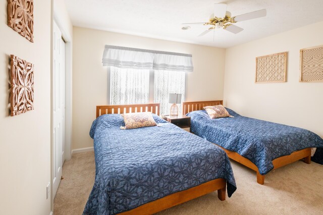 355 Windy Bush Rd, Pocono Pines, PA 18350 - bedroom featuring carpet flooring and ceiling fan