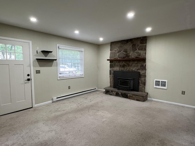 171 Linden Loop, Pocono Summit, PA 18346 - unfurnished living room featuring a baseboard heating unit, healthy amount of natural light, carpet flooring, and recessed lighting