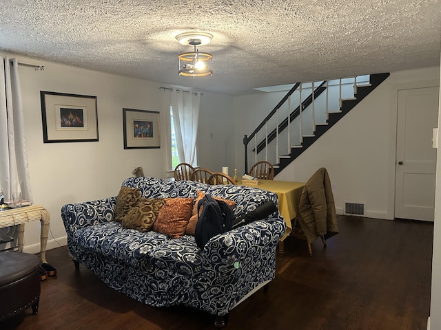 22 Quay Ave, Mount Pocono, PA 18344 - living area featuring wood finished floors, stairs, and a textured ceiling