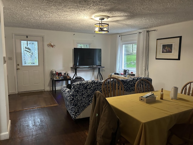 22 Quay Ave, Mount Pocono, PA 18344 - dining room with dark wood-style flooring, healthy amount of natural light, and a textured ceiling