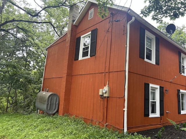22 Quay Ave, Mount Pocono, PA 18344 - view of side of property featuring heating fuel and a chimney
