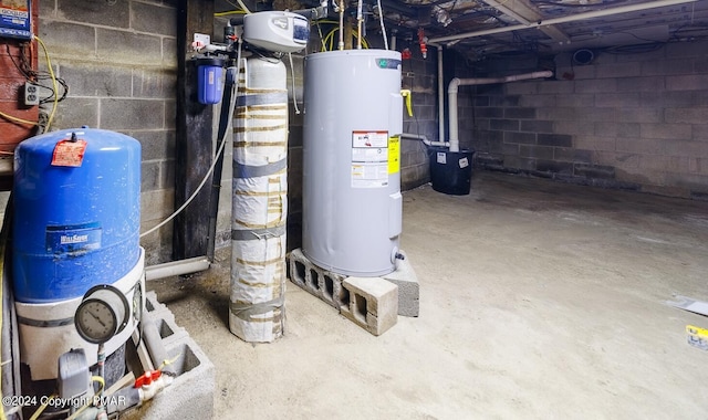 utility room featuring electric water heater