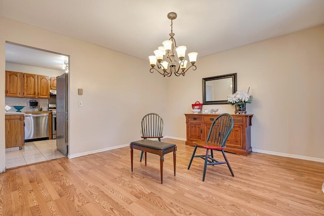 34 Heath Ln, Mount Pocono, PA 18344 - sitting room with light wood-style flooring, a chandelier, and baseboards
