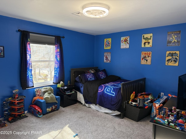 bedroom featuring carpet floors and visible vents