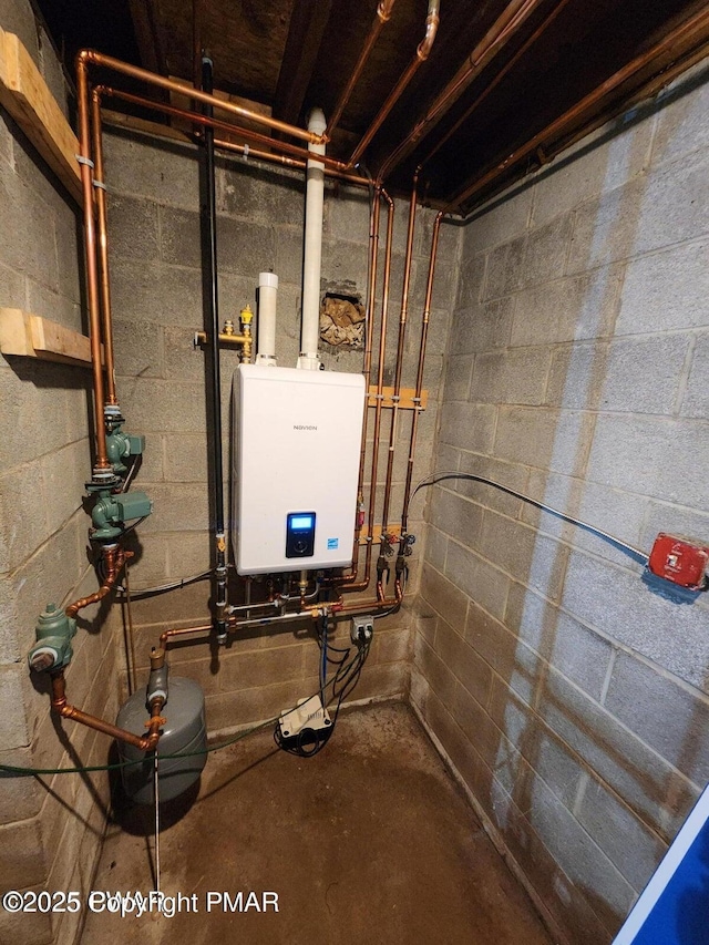 utility room featuring water heater