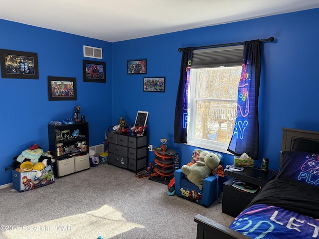 recreation room featuring carpet flooring and visible vents