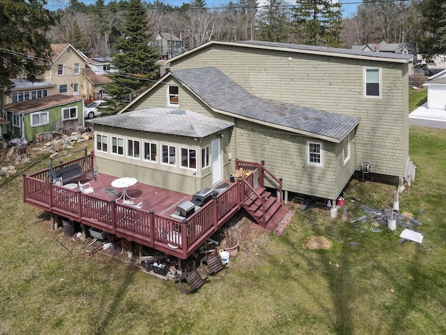 106 Silver Ln, Cresco, PA 18326 - back of house with a shingled roof, a deck, and a yard
