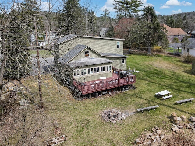 106 Silver Ln, Cresco, PA 18326 - rear view of house featuring a lawn, a shingled roof, and a wooden deck