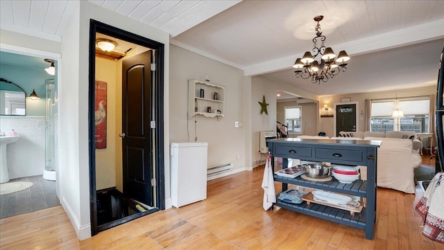 106 Silver Ln, Cresco, PA 18326 - hall with light wood-style flooring, a chandelier, a baseboard radiator, beamed ceiling, and baseboards