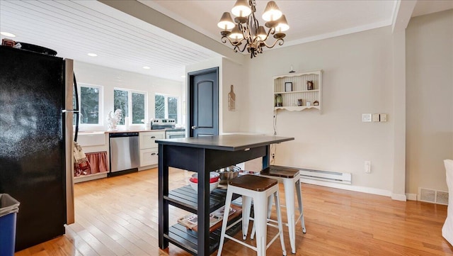 106 Silver Ln, Cresco, PA 18326 - dining area with light wood-style flooring, a chandelier, recessed lighting, and baseboards