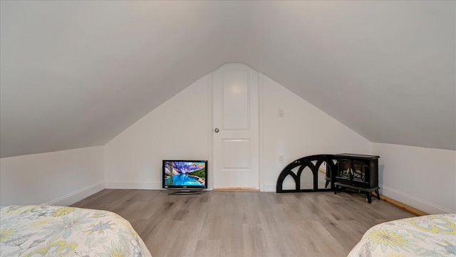 106 Silver Ln, Cresco, PA 18326 - bedroom featuring wood finished floors, baseboards, and lofted ceiling