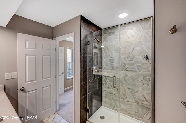 bathroom with a stall shower