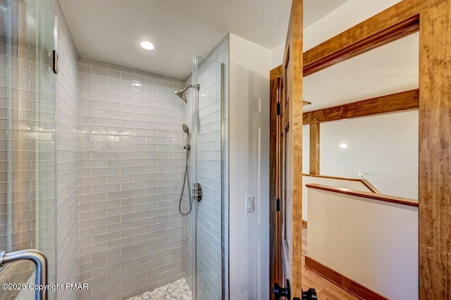 full bathroom featuring a stall shower and recessed lighting