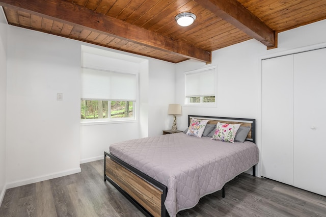 2162 Glasgow Dr, Bushkill, PA 18324 - bedroom featuring wood finished floors, a wooden ceiling with exposed beams, and a closet