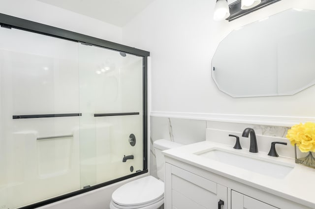 2162 Glasgow Dr, Bushkill, PA 18324 - bathroom featuring vanity and bath / shower combo with glass door
