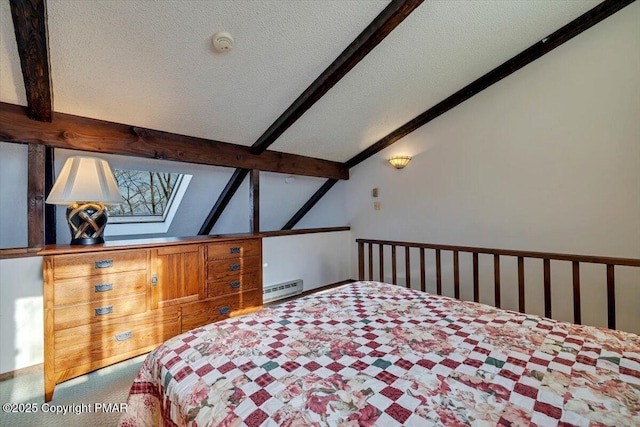 bedroom featuring a baseboard heating unit, lofted ceiling with skylight, and a textured ceiling