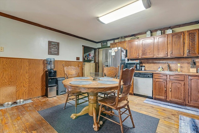 446 Dew Drop Dr, Jim Thorpe, PA 18229 - dining room with a wainscoted wall, light wood-style floors, and crown molding