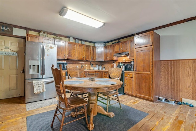 446 Dew Drop Dr, Jim Thorpe, PA 18229 - dining space featuring light wood finished floors, a wainscoted wall, and wooden walls