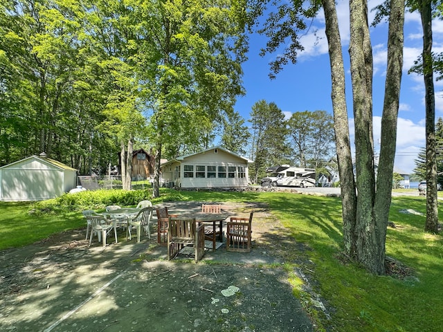 7537 Lake Shore Dr, Pocono Lake, PA 18347 - view of green lawn with a patio
