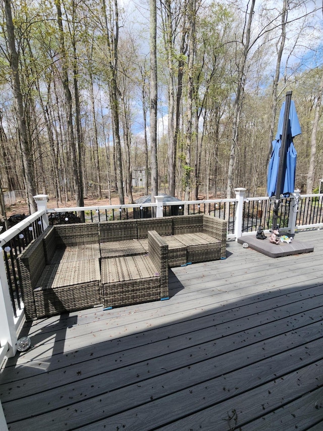 419 Quaker Ct, Pocono Lake, PA 18347 - wooden deck with view of wooded area
