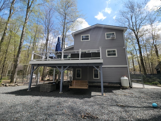 419 Quaker Ct, Pocono Lake, PA 18347 - back of house featuring a wooden deck and fence