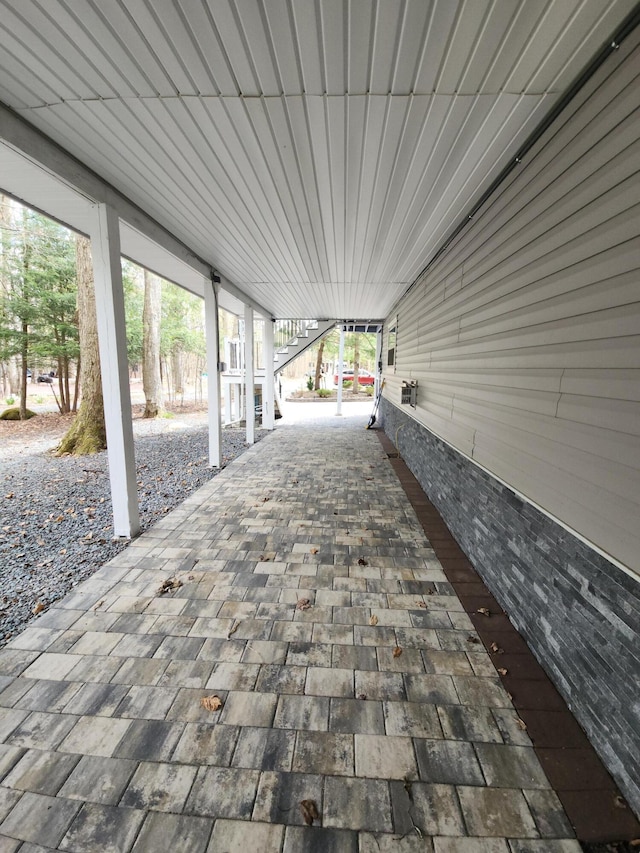 419 Quaker Ct, Pocono Lake, PA 18347 - view of patio featuring stairway
