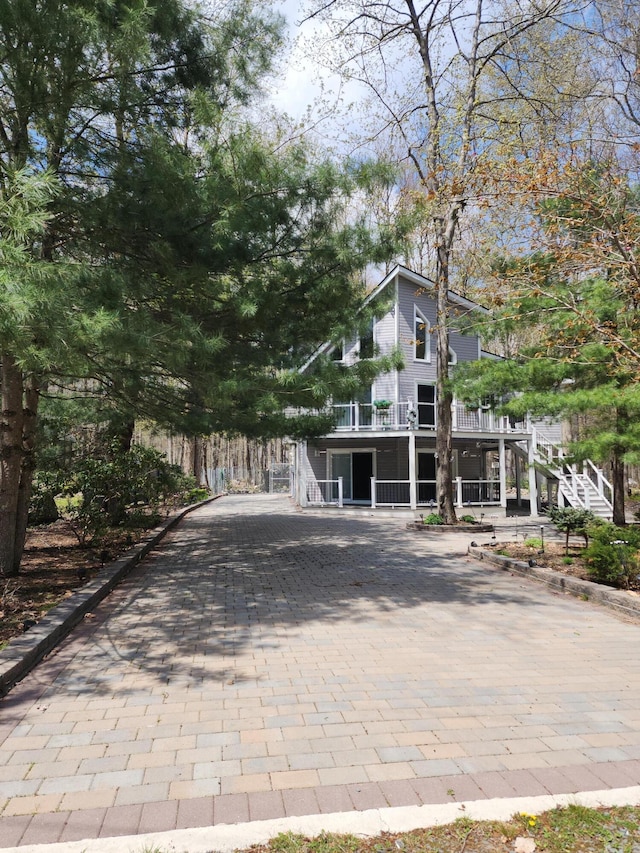 419 Quaker Ct, Pocono Lake, PA 18347 - view of front of home with stairs and driveway
