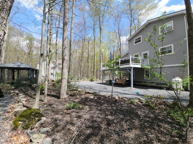 419 Quaker Ct, Pocono Lake, PA 18347 - view of yard featuring a gazebo, a deck, and a patio