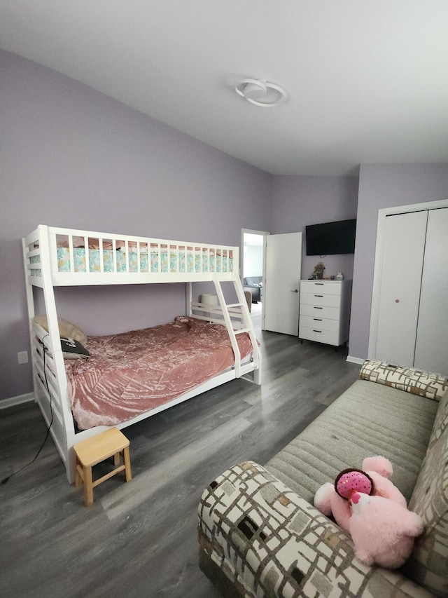 419 Quaker Ct, Pocono Lake, PA 18347 - bedroom featuring wood finished floors, baseboards, and a closet