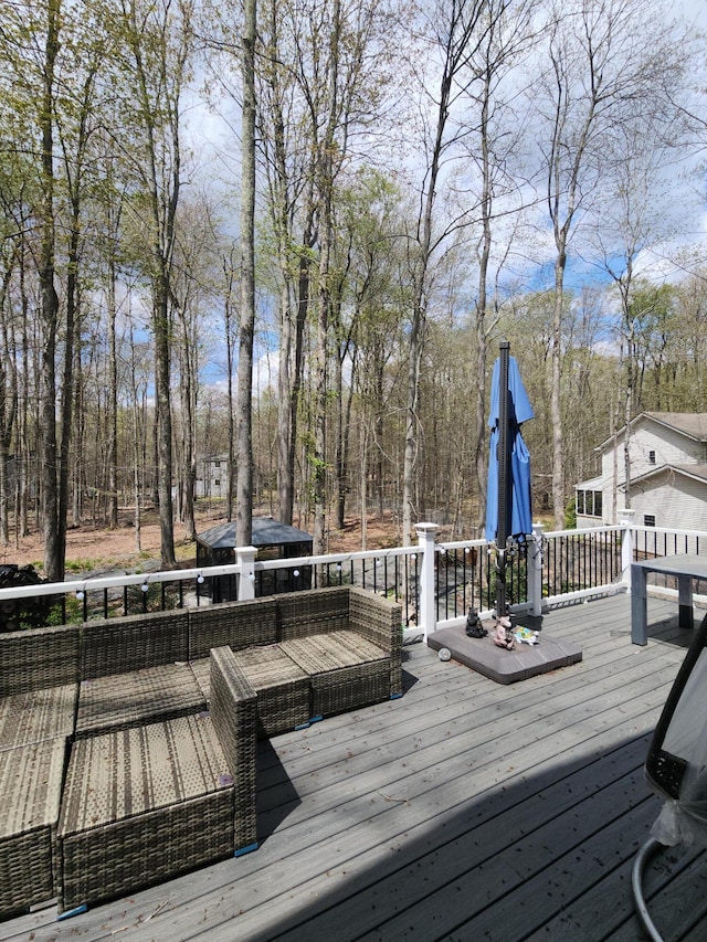 419 Quaker Ct, Pocono Lake, PA 18347 - wooden deck with view of scattered trees