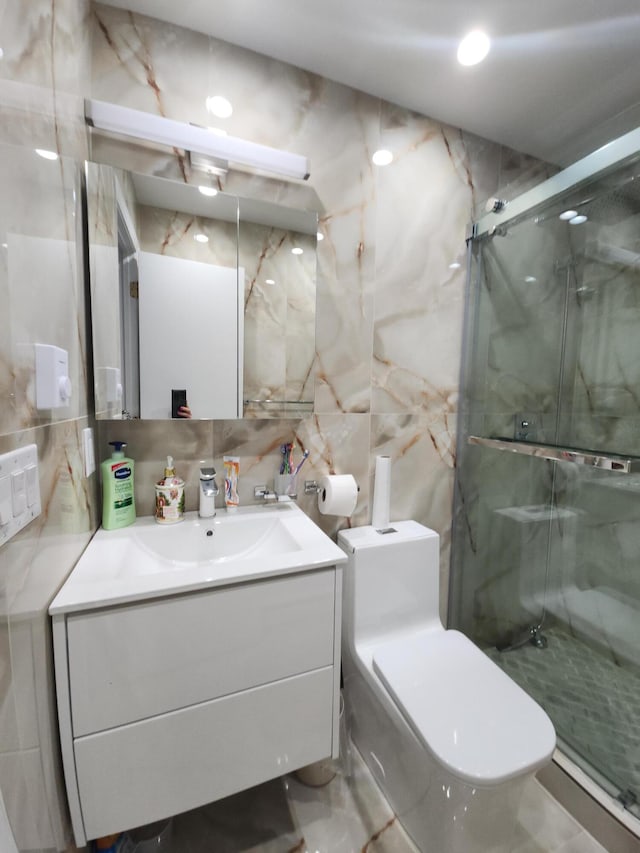 419 Quaker Ct, Pocono Lake, PA 18347 - bathroom with tile walls, vanity, a marble finish shower, toilet, and tasteful backsplash