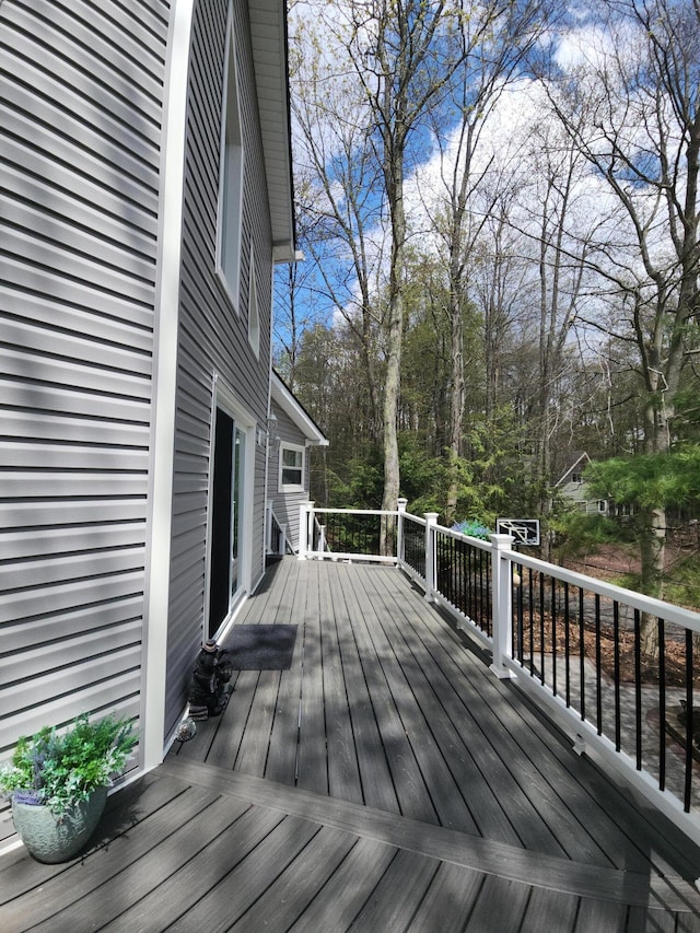 419 Quaker Ct, Pocono Lake, PA 18347 - wooden deck featuring view of scattered trees