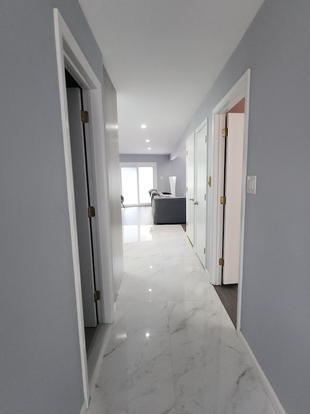 419 Quaker Ct, Pocono Lake, PA 18347 - hallway with marble finish flooring, baseboards, and recessed lighting