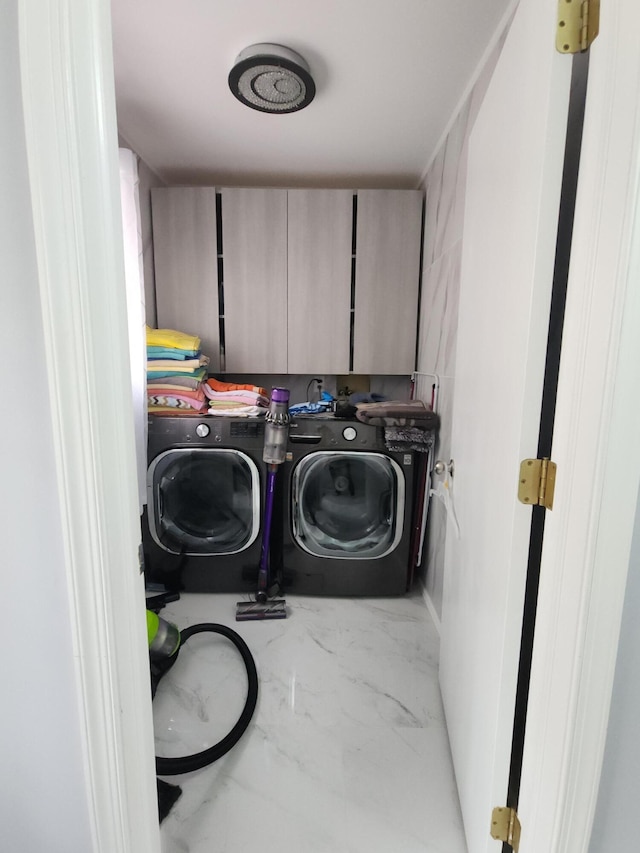 419 Quaker Ct, Pocono Lake, PA 18347 - laundry room with cabinet space, washing machine and clothes dryer, and marble finish flooring