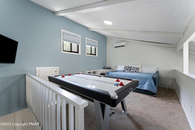 playroom with a textured ceiling, baseboards, carpet flooring, and a wall mounted air conditioner