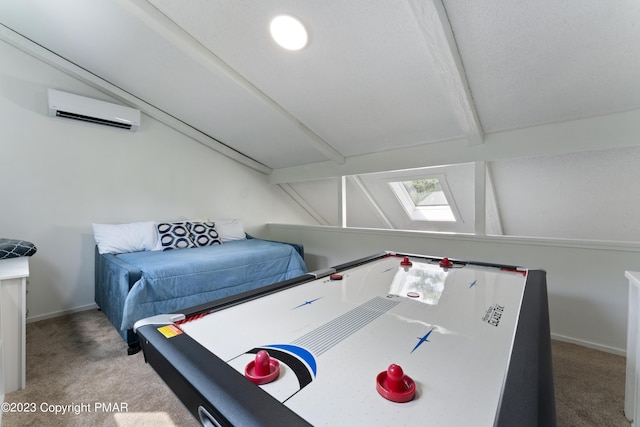 playroom with carpet floors, a wall mounted air conditioner, lofted ceiling with beams, and baseboards