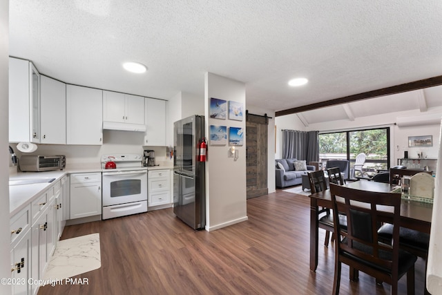 kitchen featuring vaulted ceiling with beams, a barn door, under cabinet range hood, open floor plan, and white range with electric stovetop