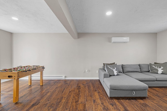 living area featuring a textured ceiling, wood finished floors, baseboard heating, and a wall mounted AC