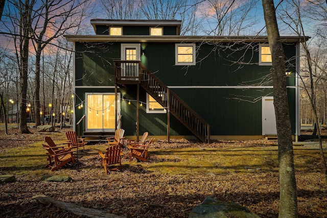 view of front of home featuring stairway and entry steps