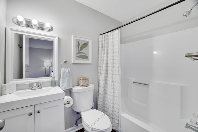 full bathroom featuring toilet, vanity, and shower / bath combination with curtain