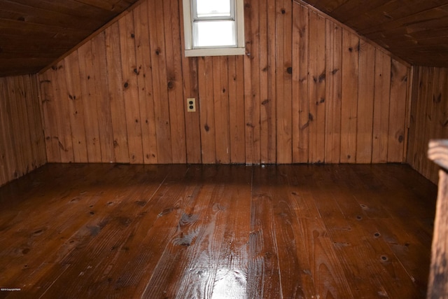 bonus room with wood walls, wood ceiling, lofted ceiling, and hardwood / wood-style flooring