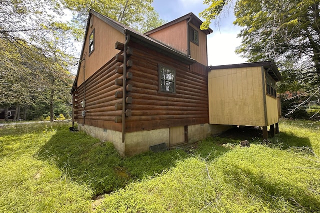 9416 Juniper Dr, Tobyhanna, PA 18466 - view of property exterior with log exterior and crawl space