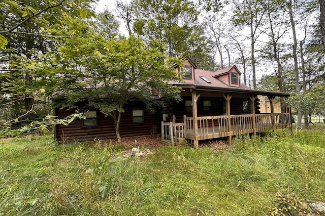 9416 Juniper Dr, Tobyhanna, PA 18466 - log cabin featuring log exterior and a wooden deck