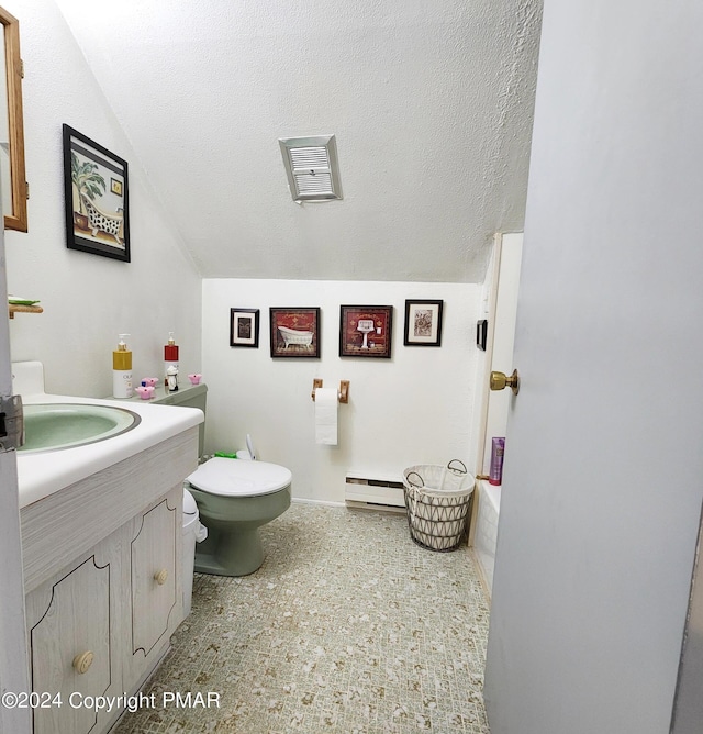 bathroom featuring a textured ceiling, a baseboard radiator, toilet, vanity, and visible vents