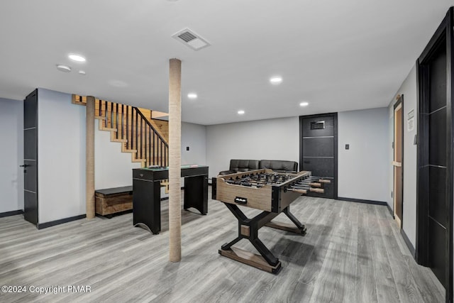 playroom with light wood-style floors, recessed lighting, and visible vents